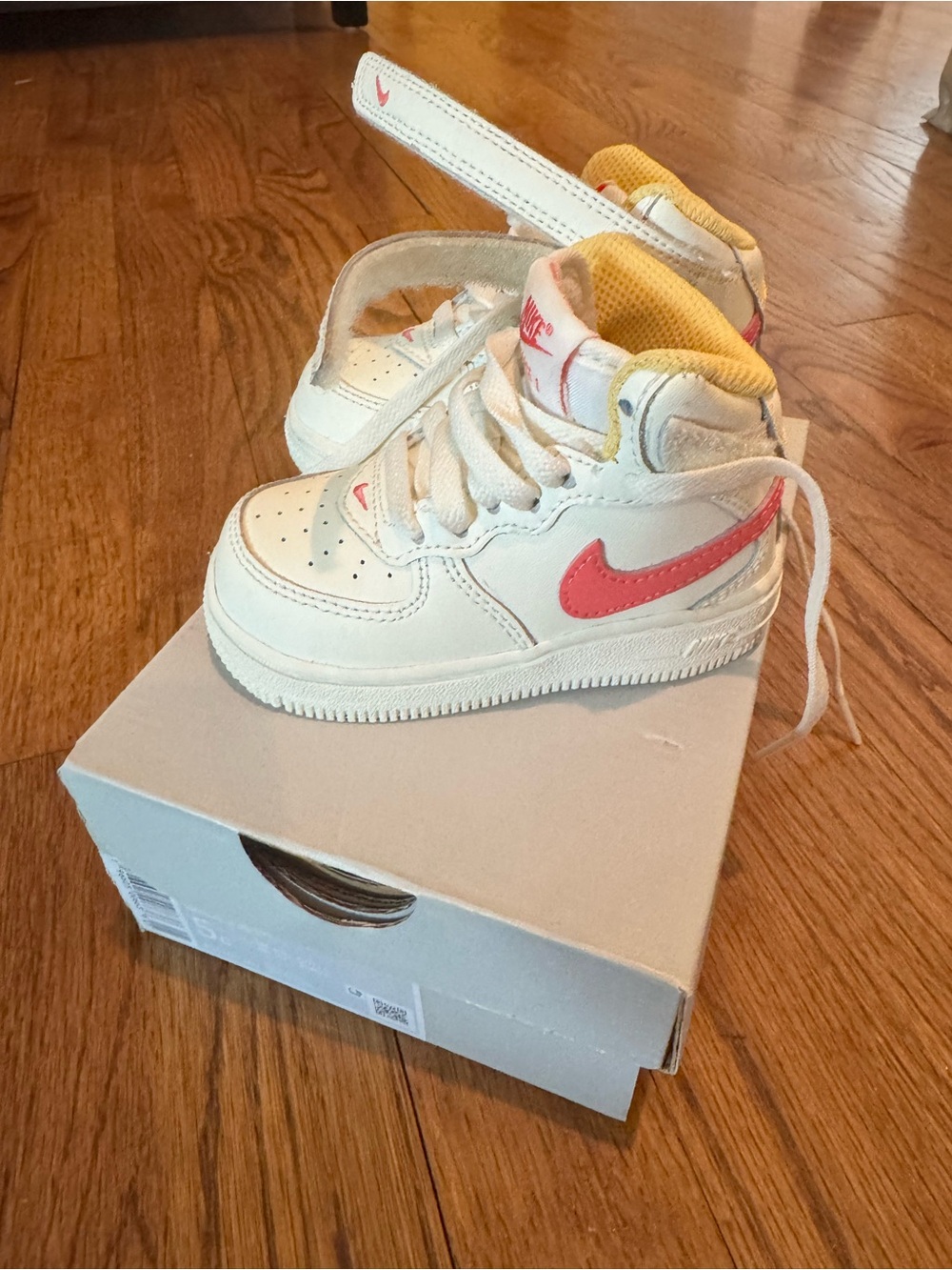 Nike Kids Air Force - White High-Top Sneakers with Pink Swoosh and Yellow Lining